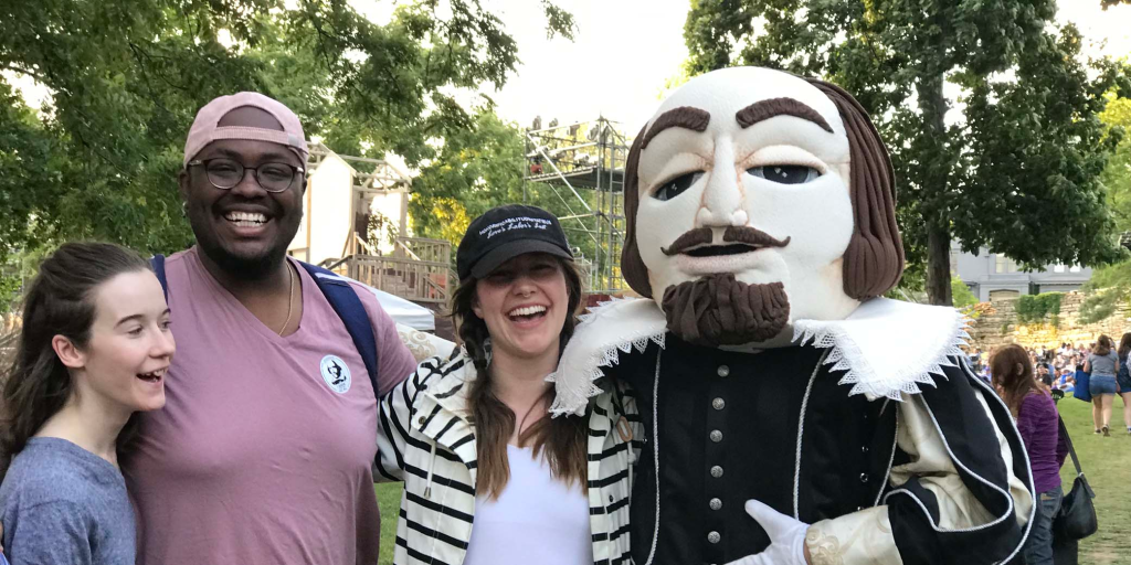 Good Will (in costume) with park audience